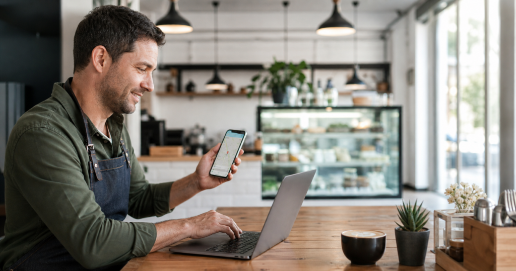 Café owner managing business digitally